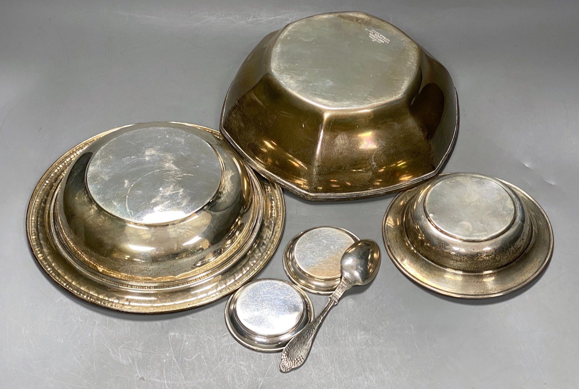 An early 20th century Tiffany & Co hexagonal sterling 925 fruit bowl, diameter 21.9cm, together with two other sterling bowls, two small sterling dishes and a sterling spoon, 29oz.